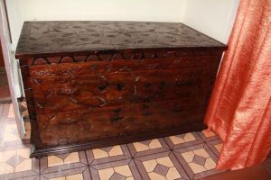 Carved wooden chest.